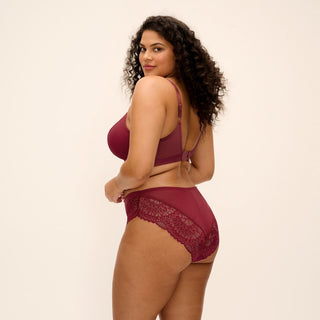 Model wearing Elomi Tiernie brief in Tibetan Red, alternative view 1