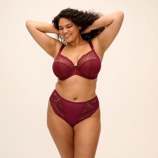 Model wearing Elomi Tiernie plunge bra in Tibetan Red, front view