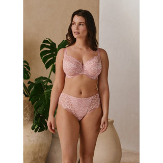 Lifestyle shot of model wearing Fantasie Emmaline side support bra in Blossom with matching brief