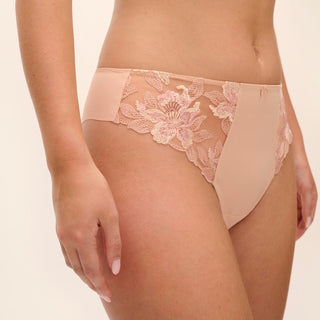 Model wearing Fantasie Magdalena thong in Natural Beige, front view