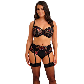 Model wearing Fantasie Magdalena suspender belt in Noir with matching balconette bra and thong, front view