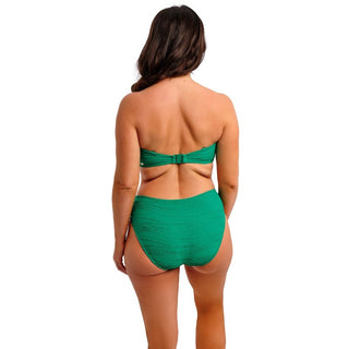 Model wearing Fantasie Swim Beach Waves mid rise bikini brief in Tourmaline, back view